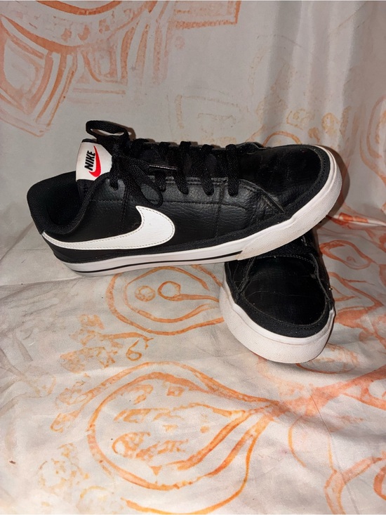 Nike Shoes - Nike Black Leather Low-Top Sneakers with White Swoosh and Sole